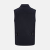 View 4 of product The Turnbull & Asser Navy Collared Single-breasted Waistcoat features a sleeveless design, wool-cashmere blend, two zippered side pockets, and a chest pocket—ideal for upgrading your winter look—shown on a white background.