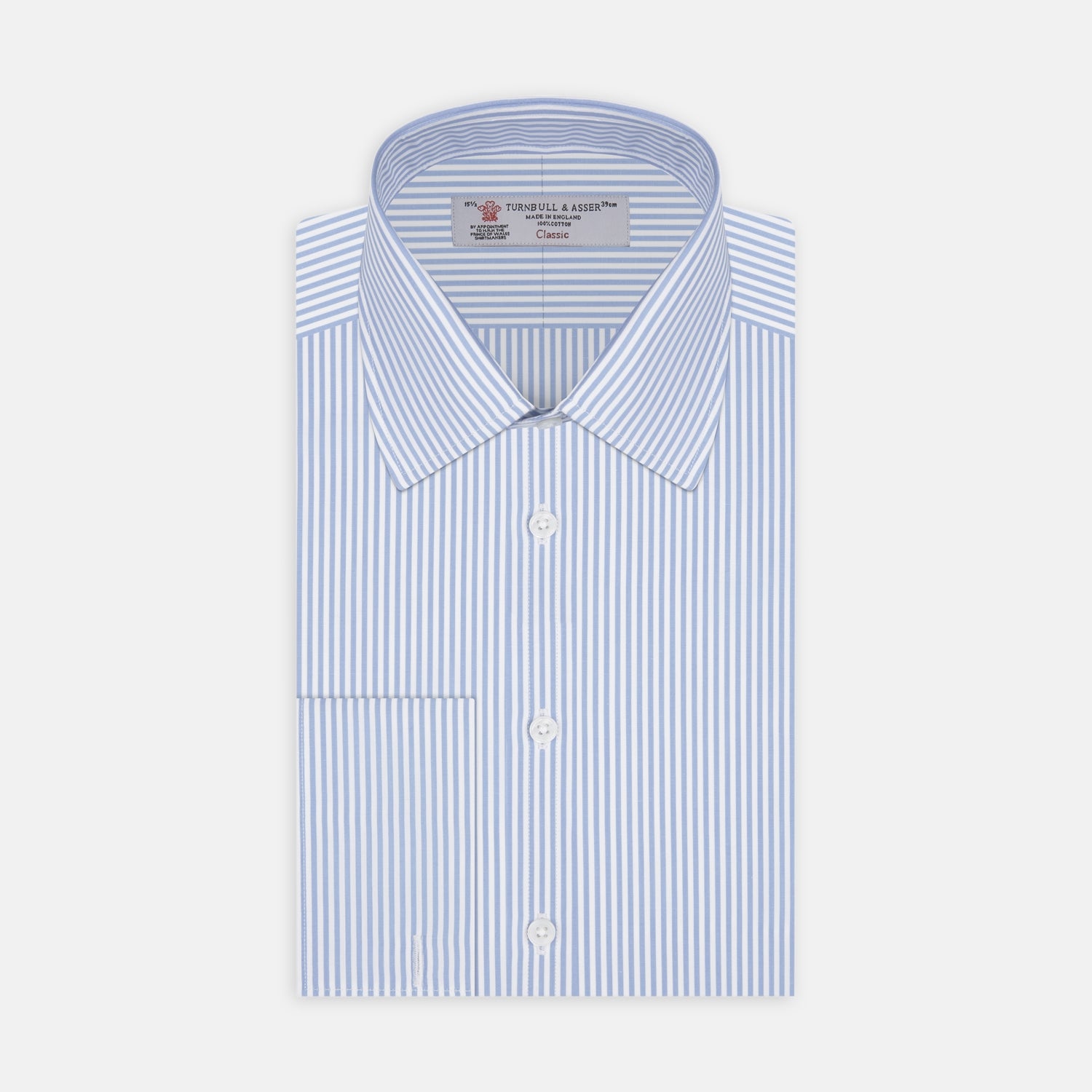 View 1 of product The Turnbull & Asser Light Blue Bengal Stripe Shirt features a classic T&A collar, double cuffs, and white buttons. Made from cotton with blue and white stripes, it's neatly displayed against a plain white background.