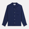 View 1 of product The Turnbull & Asser Navy and Blue Multi Stripe Silk Holiday Fit Winnington Shirt features white buttons, a notched collar, and a chest pocket, shown laid flat on a white background.