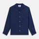 The Turnbull & Asser Navy and Blue Multi Stripe Silk Holiday Fit Winnington Shirt features white buttons, a notched collar, and a chest pocket, shown laid flat on a white background.