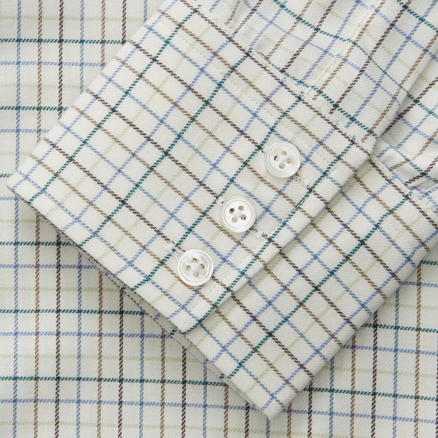 View 3 of product A Turnbull & Asser Green Tattersall Check Cashmerello Regular Fit Mayfair Shirt, featuring a long-sleeve button-up style with a green checkered pattern, is displayed on a plain white surface.