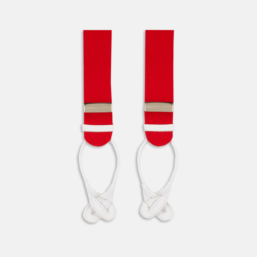 Two Red Adjustable Felt Braces by Turnbull & Asser, featuring white leather ends and silver-tone clasps, made in England from classic boxcloth, are laid flat on a white background.