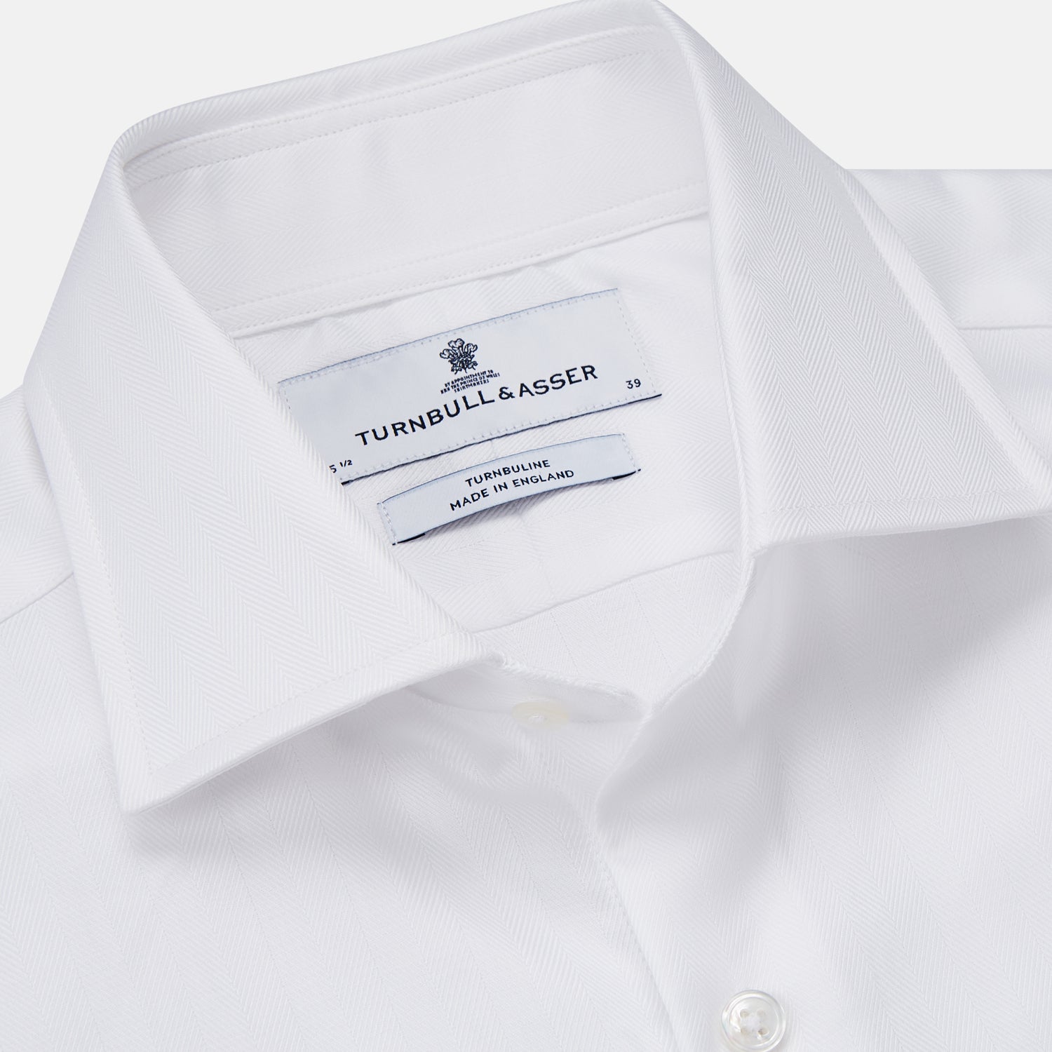View 2 of product The Turnbull & Asser White Herringbone Tailored Fit Shirt with a Kent collar is displayed on a white background.