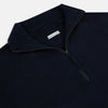 View 2 of product The Midnight Blue Half-Zip Cashmere Jumper by Turnbull & Asser features a stand collar, long sleeves, and quarter-zip closure, crafted from premium cashmere and shown against a plain white background.
