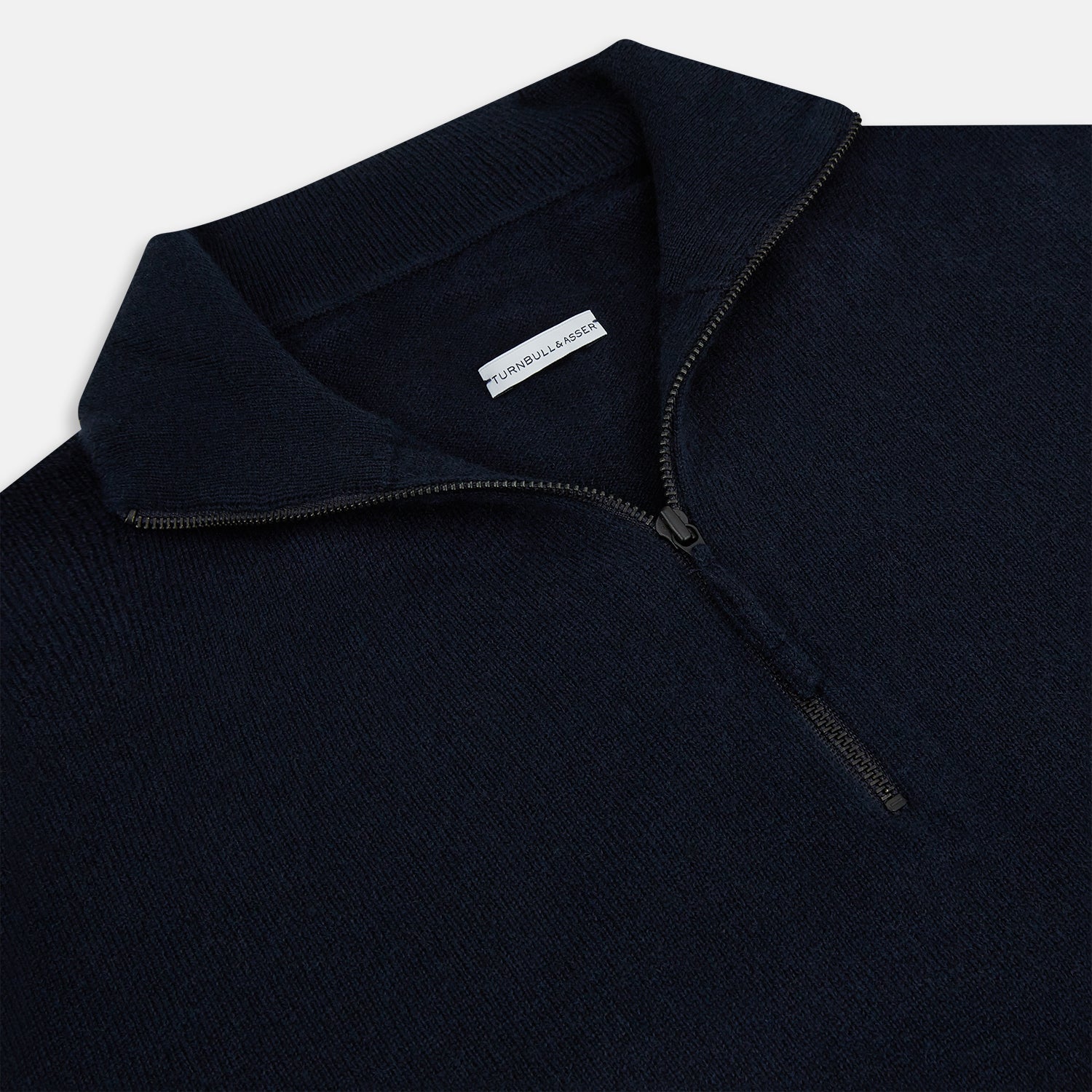 View 2 of product The Midnight Blue Half-Zip Cashmere Jumper by Turnbull & Asser features a stand collar, long sleeves, and quarter-zip closure, crafted from premium cashmere and shown against a plain white background.
