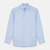 View 1 of product The Blue Prince of Wales Check Mayfair Shirt by Turnbull & Asser features a light blue check pattern, white buttons, and a classic collar. Crafted from premium Italian cotton, it is displayed on a plain white background.