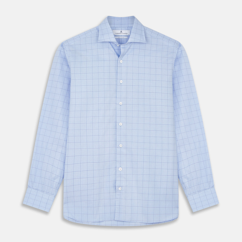 The Blue Prince of Wales Check Mayfair Shirt by Turnbull & Asser features a light blue check pattern, white buttons, and a classic collar. Crafted from premium Italian cotton, it is displayed on a plain white background.