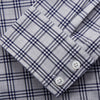 View 4 of product The Turnbull & Asser Grey Multi Check Cotton Tailored Fit Shelton Shirt is neatly laid flat on a white background.