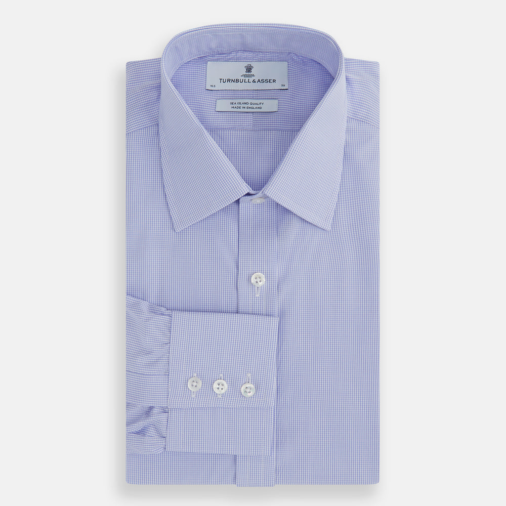 The Turnbull & Asser Blue Fine Check Sea Island Quality Cotton Shirt features a T&A collar, 3-button cuffs, and white buttons, shown on a plain white background.