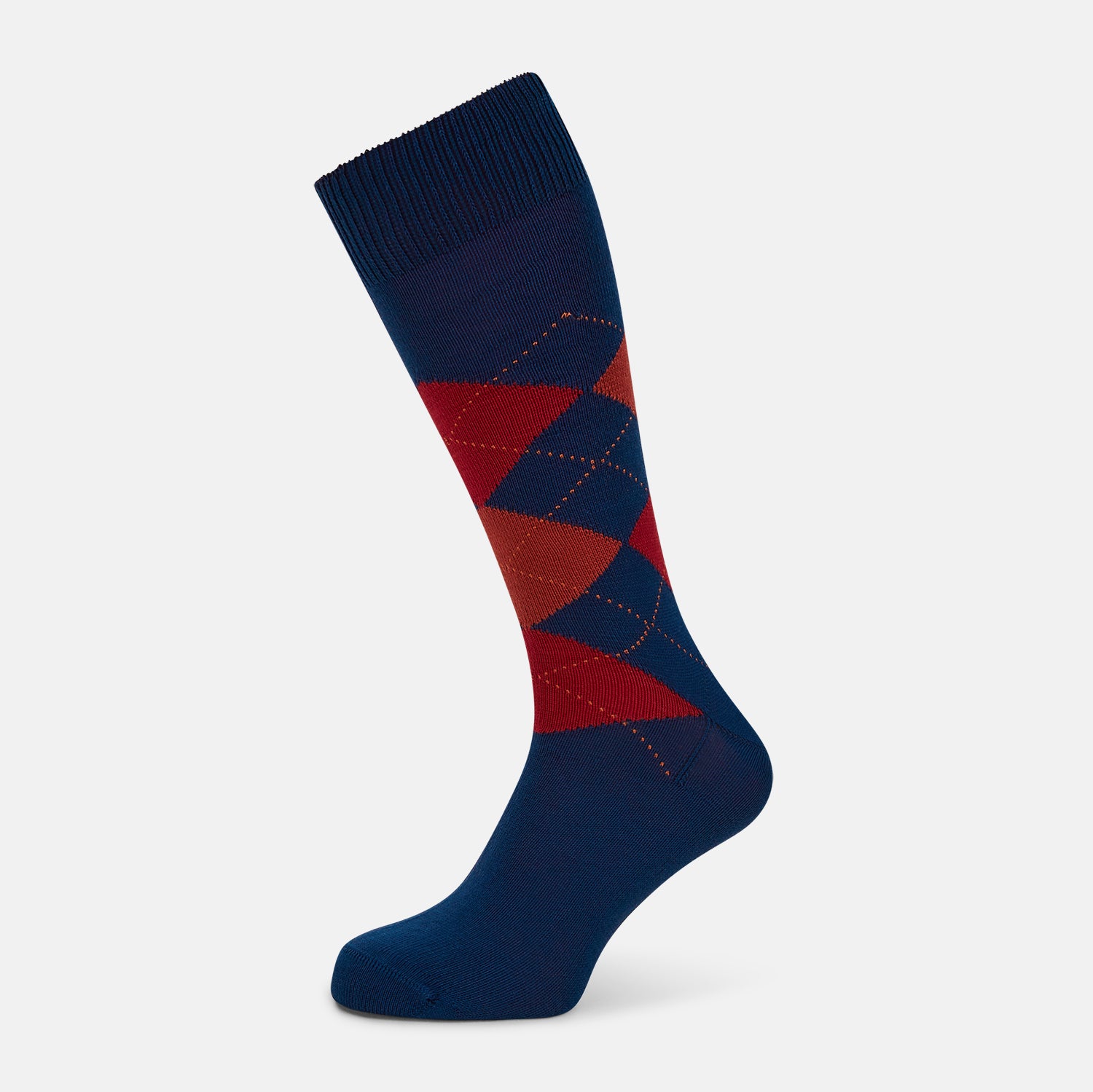 View 1 of product Turnbull & Asser’s Royal Blue Check Mid-Length Sock features a blue base with red, orange, and blue checks on the calf, shown against a plain white background.