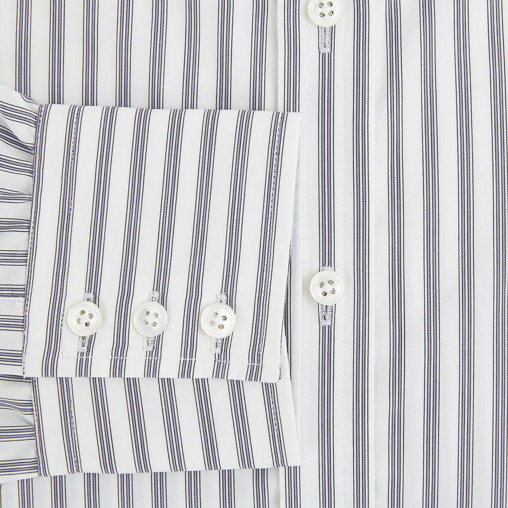 The Purple Multi Stripe Mayfair Shirt from Turnbull & Asser is a pure cotton, collared long-sleeve shirt with white and gray vertical stripes and buttoned cuffs, displayed flat on a white background.