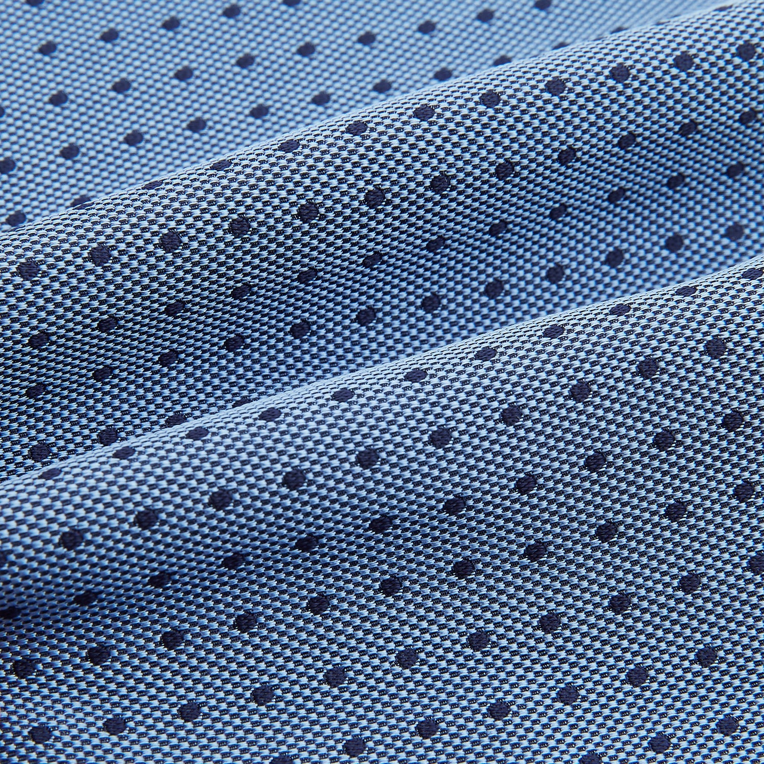 View 4 of product The Turnbull & Asser Navy and Blue Micro Dot Silk Cravat, featuring a refined dot pattern, makes an elegant statement when paired with a matching pocket square, showcased here against a white background.