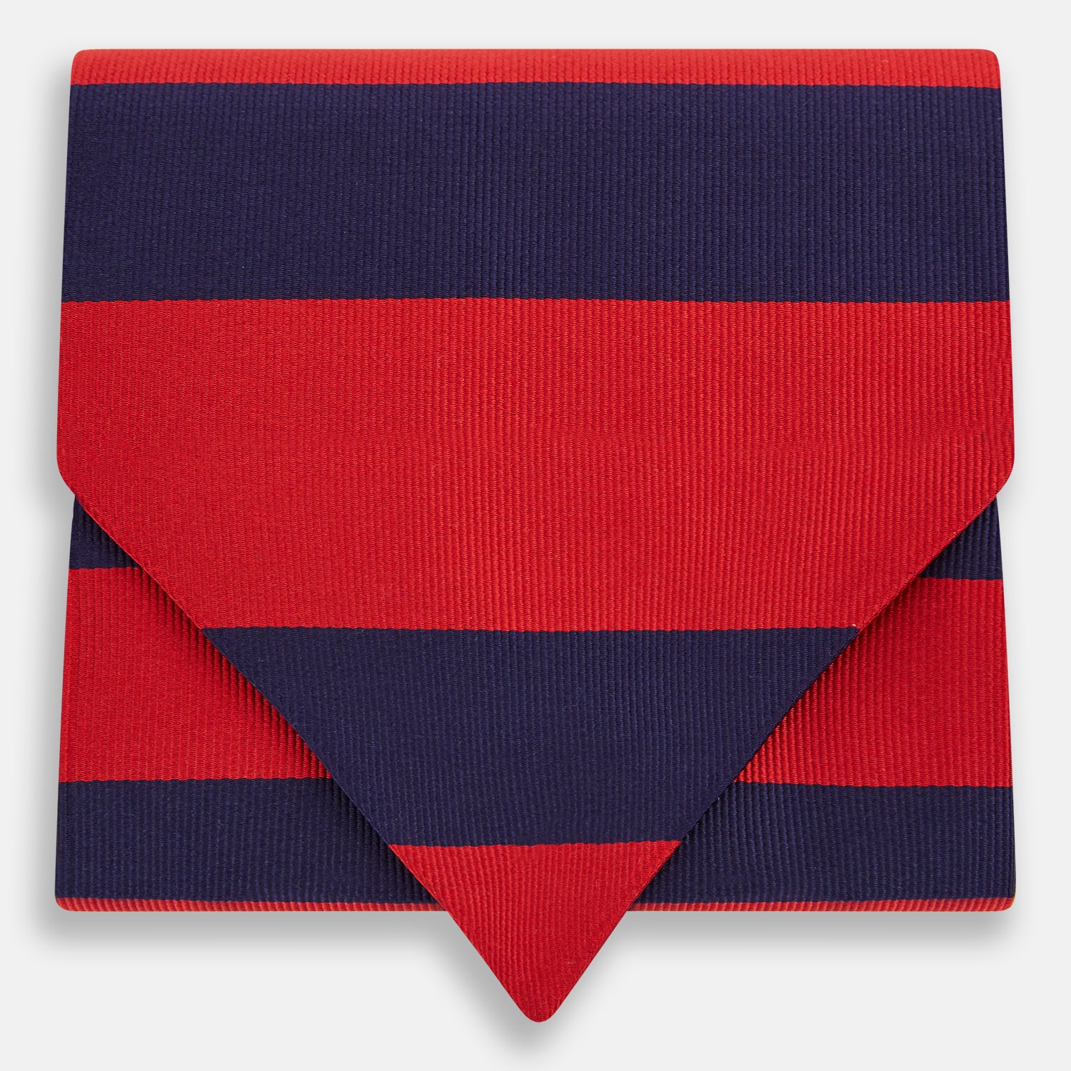 View 1 of product The Turnbull & Asser Wide Red Stripe and Navy Silk Cravat features bold diagonal stripes, adding a refined touch of British elegance to any ensemble.