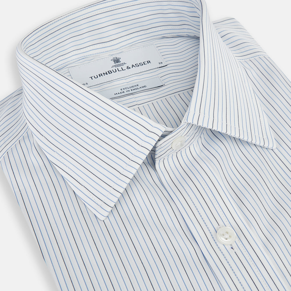 The Navy and Blue Pinstripe Mayfair Shirt by Turnbull & Asser, featuring a classic collar and crafted from premium Italian cotton, is shown against a white background.