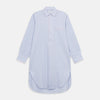View 1 of product The Blue and Pink Stripe Poplin Cotton Nightshirt by Turnbull & Asser features long sleeves, a collar, front buttons, chest pocket, rounded hem, and light blue fabric with white, pink, and yellow vertical stripes.