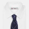 View 2 of product The Turnbull & Asser WINDOW PANE NAVY WHITE TIE features navy blue silk with a subtle diagonal ribbed texture and white windowpane checks, making it the perfect men’s accessory for any formal occasion.