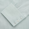 View 3 of product The Turnbull & Asser Light Green Chambray Regular Fit Mayfair Shirt for men features long sleeves, a collar, white buttons, and buttoned cuffs, displayed flat on a white background.
