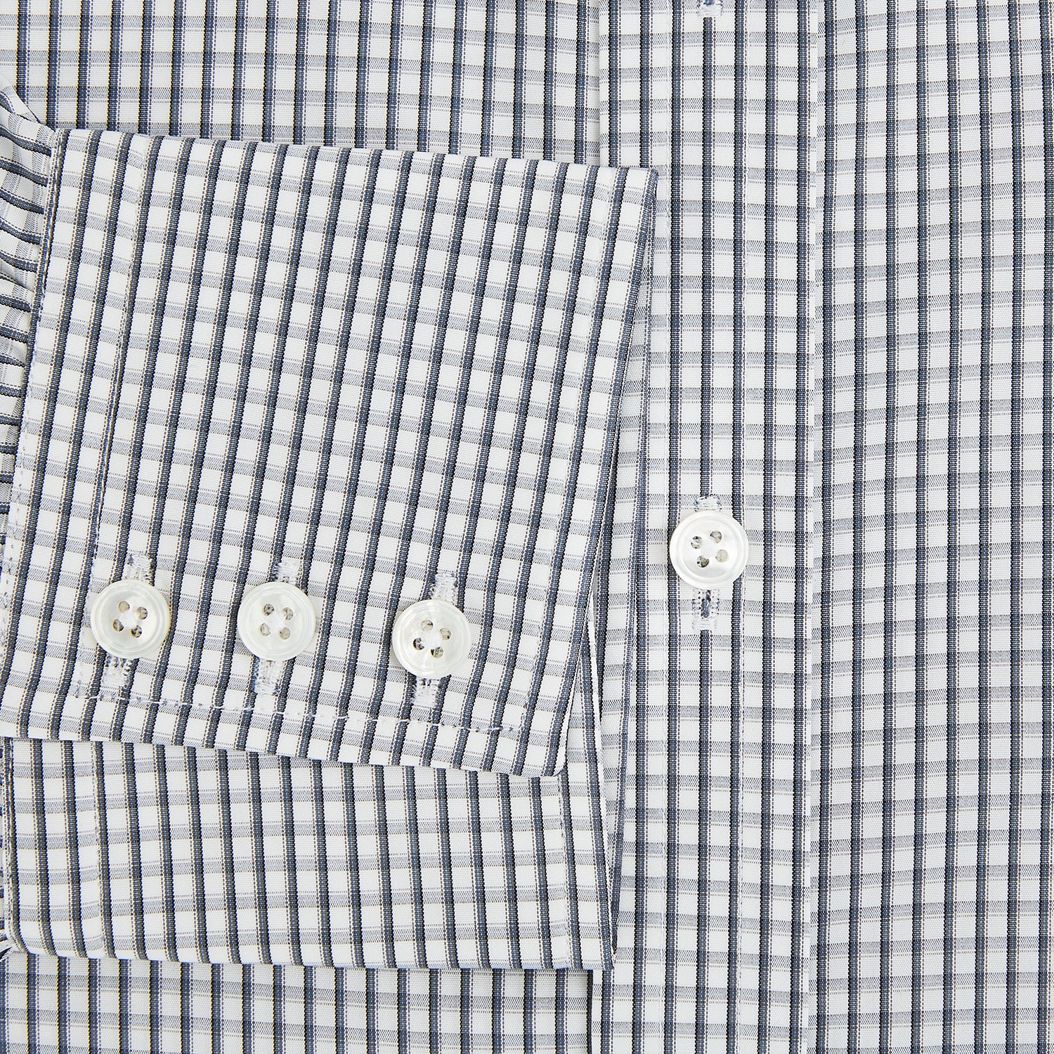 View 4 of product The Grey Double Graph Mayfair Shirt by Turnbull & Asser is a long-sleeve, button-down cotton shirt with a black and white double graph check, chest pocket, and classic collar.