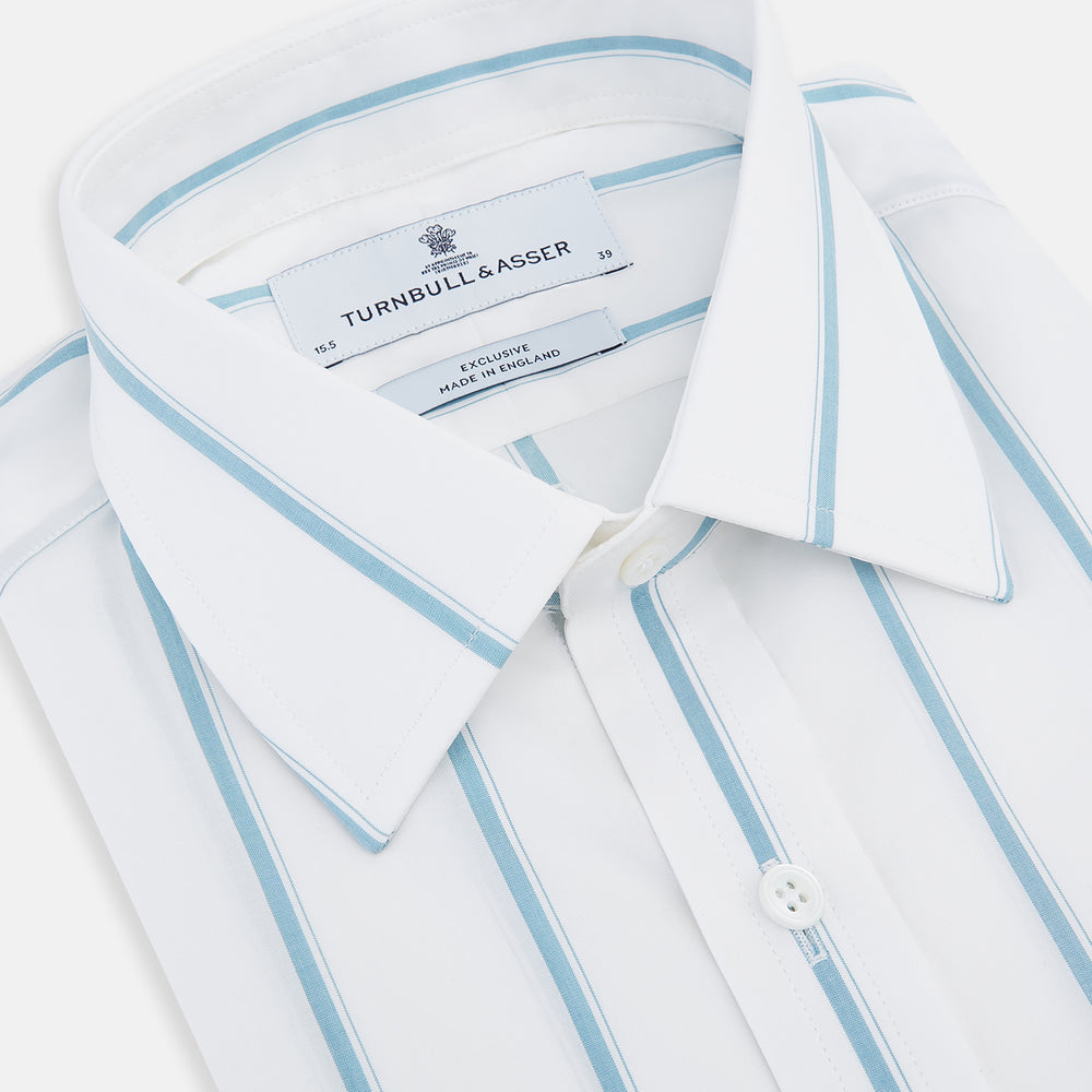 The Turnbull & Asser Turquoise Track Stripe Mayfair Shirt is crafted from Italian cotton with long sleeves, turquoise vertical stripes, a classic collar, and buttoned cuffs, displayed on a plain white background.