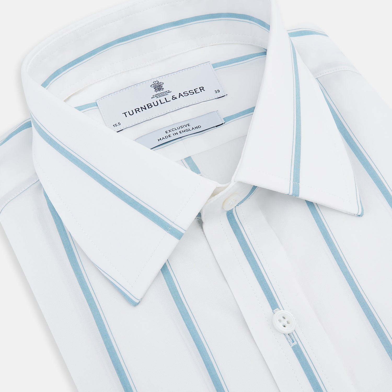 View 2 of product The Turnbull & Asser Turquoise Track Stripe Mayfair Shirt is crafted from Italian cotton with long sleeves, turquoise vertical stripes, a classic collar, and buttoned cuffs, displayed on a plain white background.