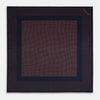 View 4 of product The Turnbull & Asser Navy and Orange Dot Silk Pocket Square features exquisite handmade craftsmanship.
