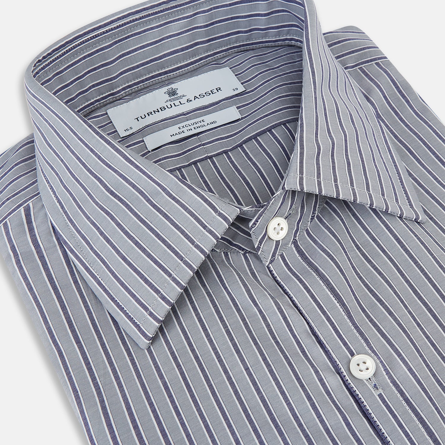 View 2 of product The Turnbull & Asser Grey Ticking Stripe Westminster Shirt features thin vertical grey stripes and a classic collar, showcased against a plain white background.