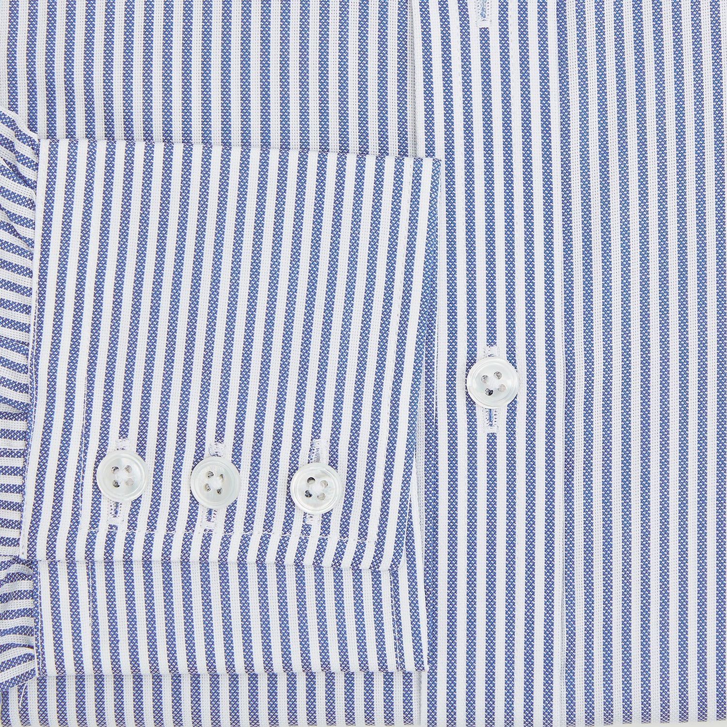 View 4 of product The Turnbull & Asser Navy Bengal Stripe Mayfair Shirt is a long-sleeved, collared formal shirt with blue and white stripes, white buttons, and buttoned cuffs—ideal for classic style enthusiasts. Displayed on a plain white background.