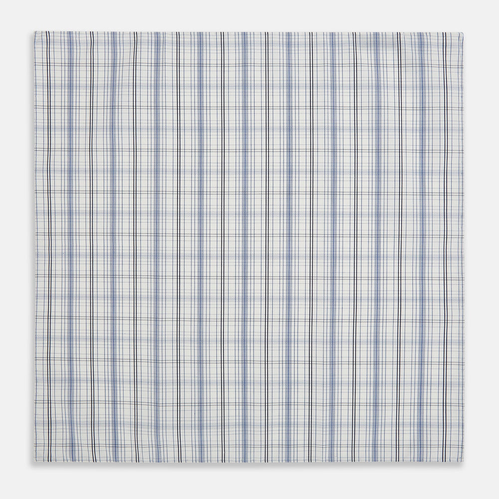The Turnbull & Asser Blue and Navy Multi Check Hand-Rolled Handkerchief features a blue and white plaid design with thin, evenly spaced lines, shown flat against a white background.