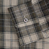 View 3 of product The Brown Multi Check Linen Weekend Fit Unwin Shirt by Turnbull & Asser features a beige, brown, and black plaid pattern, stand collar, button-up front, long sleeves, and two buttoned chest pockets.