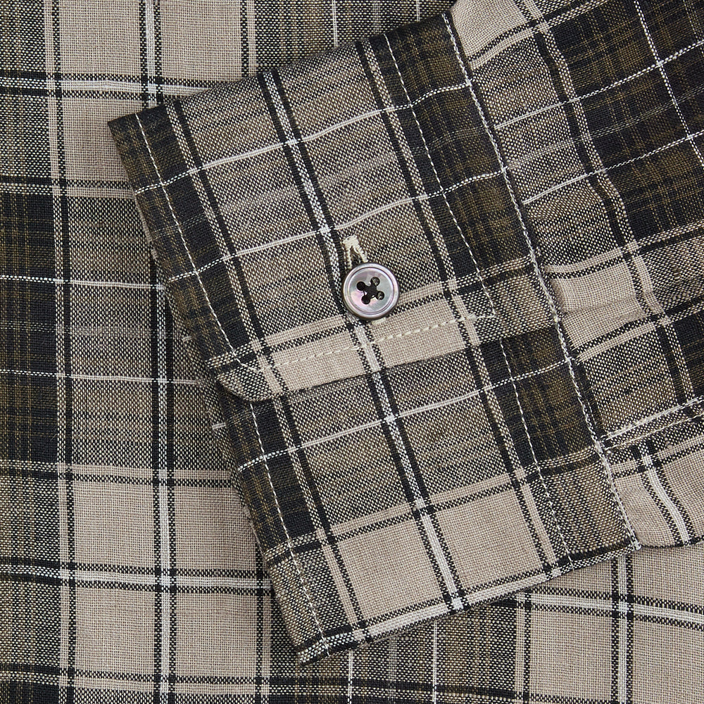 The Brown Multi Check Linen Weekend Fit Unwin Shirt by Turnbull & Asser features a beige, brown, and black plaid pattern, stand collar, button-up front, long sleeves, and two buttoned chest pockets.
