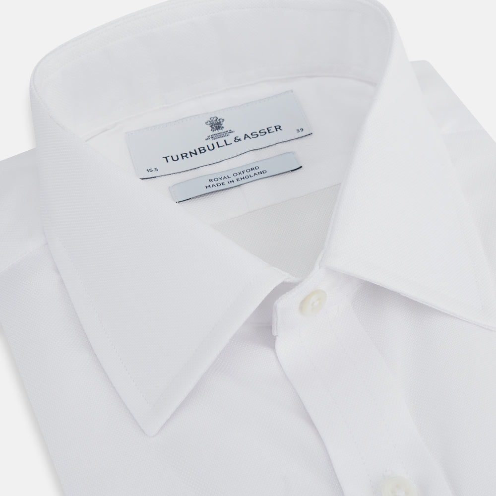 The Turnbull & Asser White Superfine Oxford Cotton Shirt features a T&A collar and 3-button cuffs—ideal for elegant evening attire, shown against a white background.