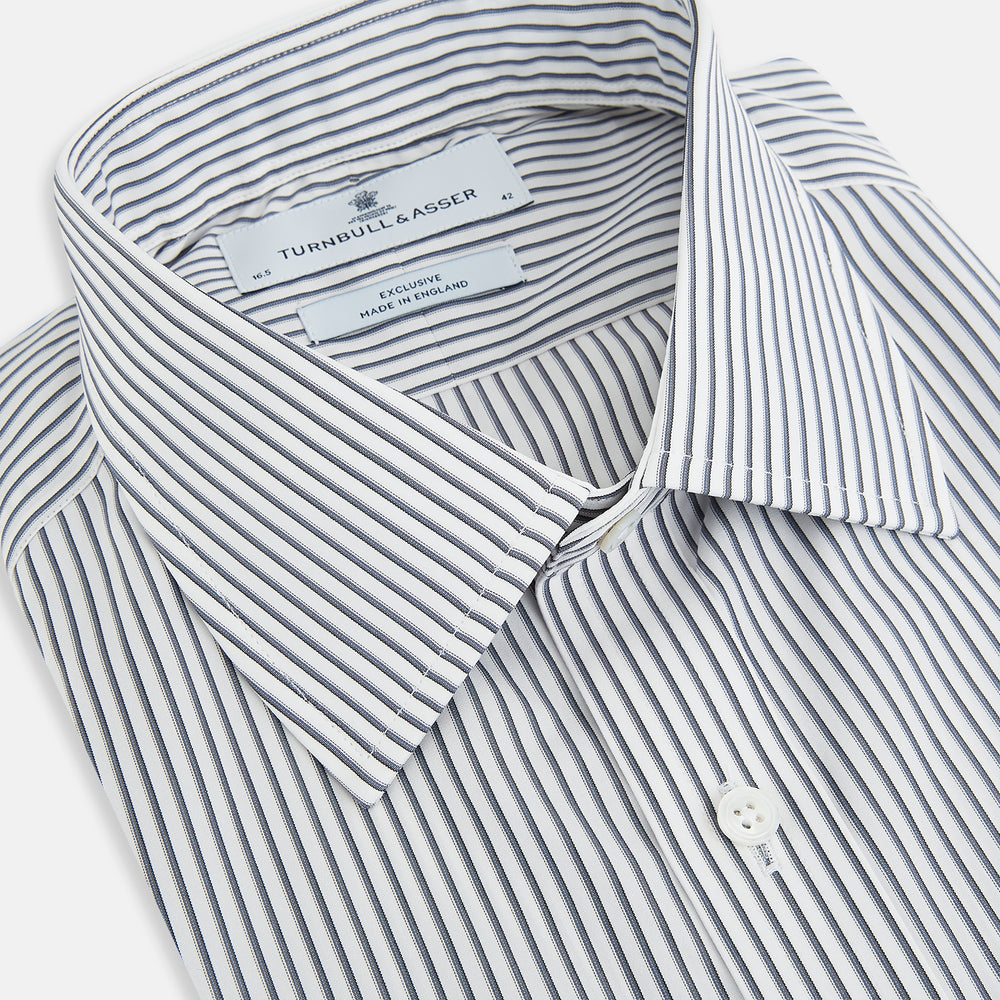 The Turnbull & Asser Grey Multi Stripe Mayfair Shirt features long sleeves, a classic collar, and thin vertical stripes in black and white, shown laid flat on a white background.