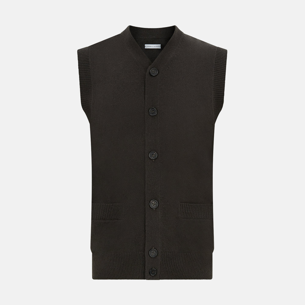 The Turnbull & Asser Dark Brown Cashmere Sleeveless Cardigan has a V-neck, button-up front, two front pockets, and ribbed trim on the armholes and hem, shown against a plain white background.