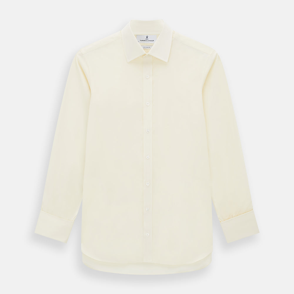 The Turnbull & Asser Cream Cotton Shirt features a T&A collar and double cuffs, elevating men's style. Displayed flat against a white background, this long-sleeve shirt is crafted in classic cream cotton.