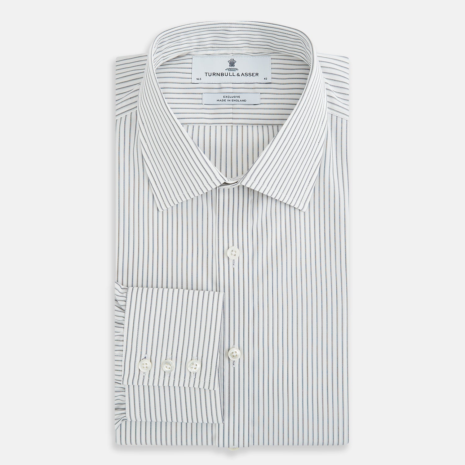 View 5 of product The Navy Music Stripe Mayfair Shirt by Turnbull & Asser features thin vertical blue and white stripes, a classic T&A collar, and long sleeves, shown on a plain white background.