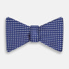 View 1 of product The Turnbull & Asser Blue and White Diamond Silk Bow Tie features a repeating pattern of small white diamonds and vertical ribbing, making it perfect for formalwear. Displayed on a white background.