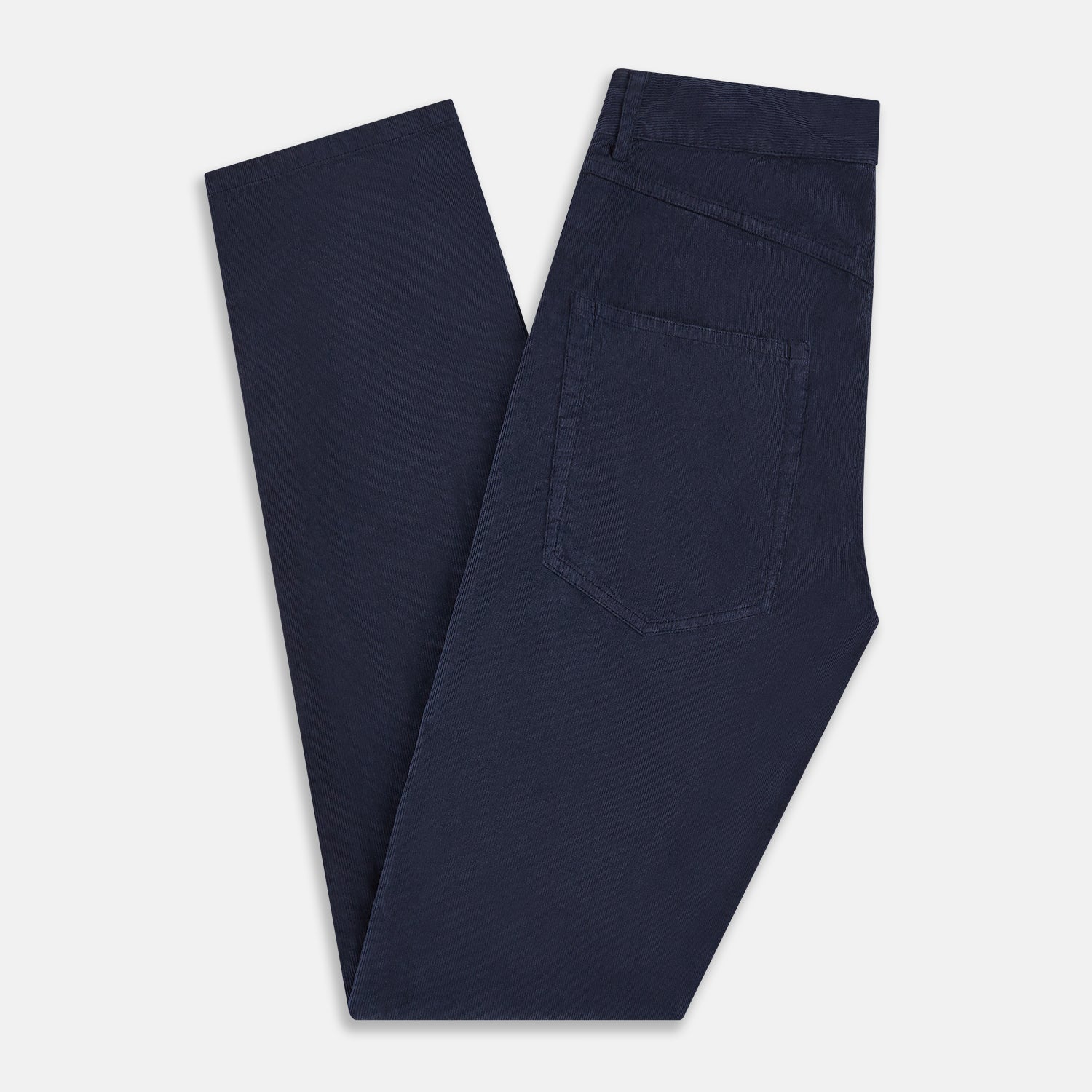 View 6 of product The Turnbull & Asser Light Navy Corduroy Charles Trousers feature a straight-leg fit, stretch cotton, belt loops, front pockets, and a button-zip closure—highlighting British tailoring against a white background.