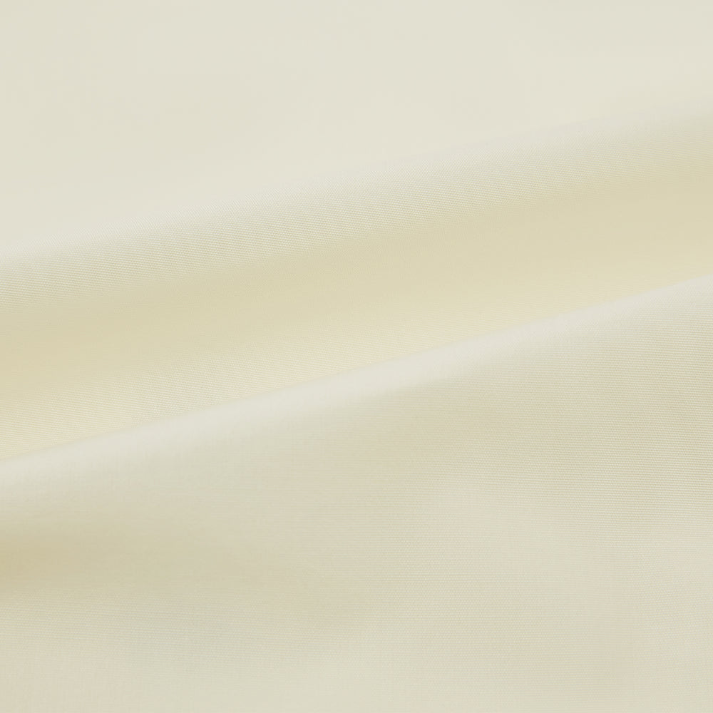 The Turnbull & Asser Cream Cotton Shirt features a T&A collar and double cuffs, elevating men's style. Displayed flat against a white background, this long-sleeve shirt is crafted in classic cream cotton.