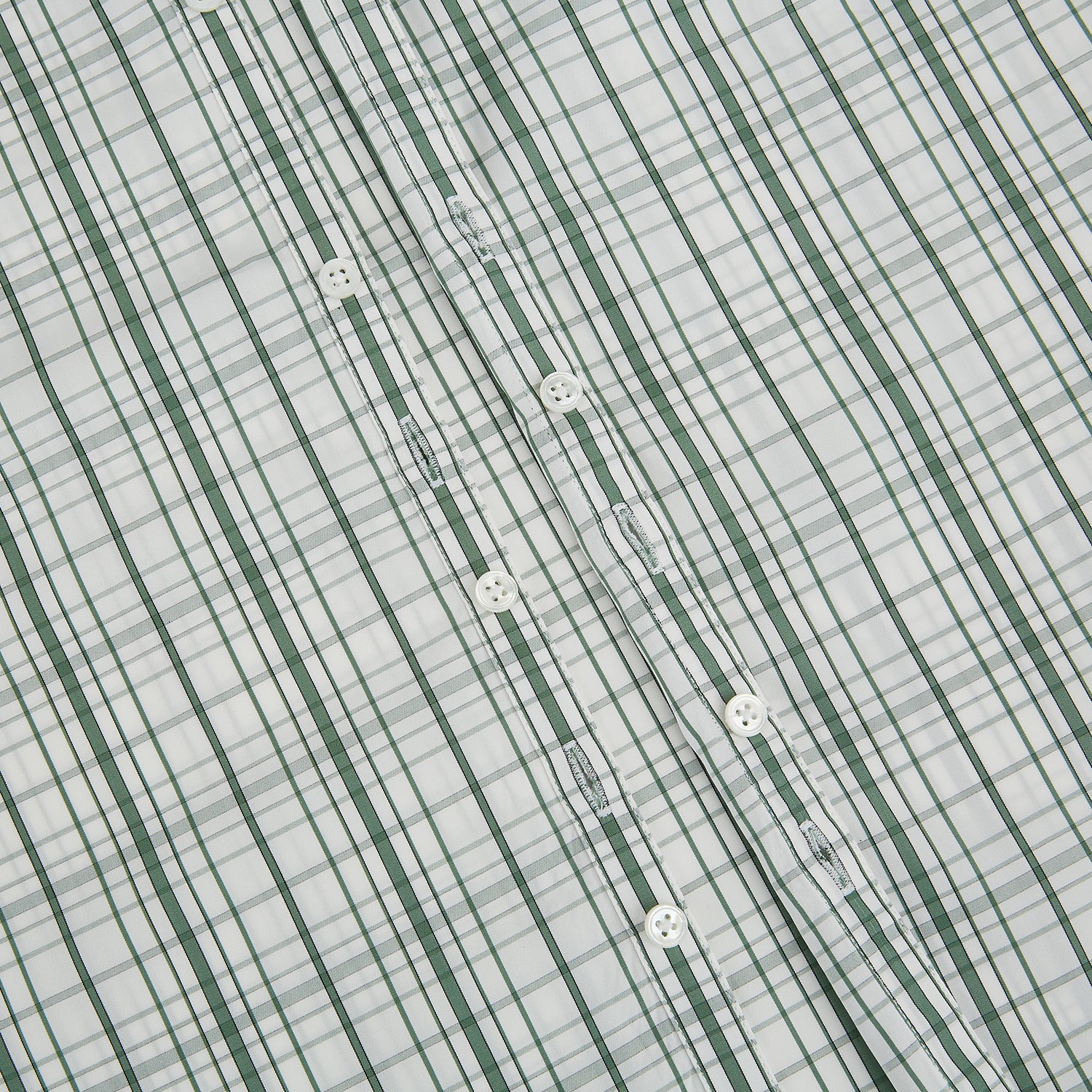 View 7 of product The Turnbull & Asser Sage Green Plaid Check Westminster Shirt features a collared, long-sleeve button-up design with a white base and sage green plaid pattern, showcasing classic British craftsmanship against a clean white background.