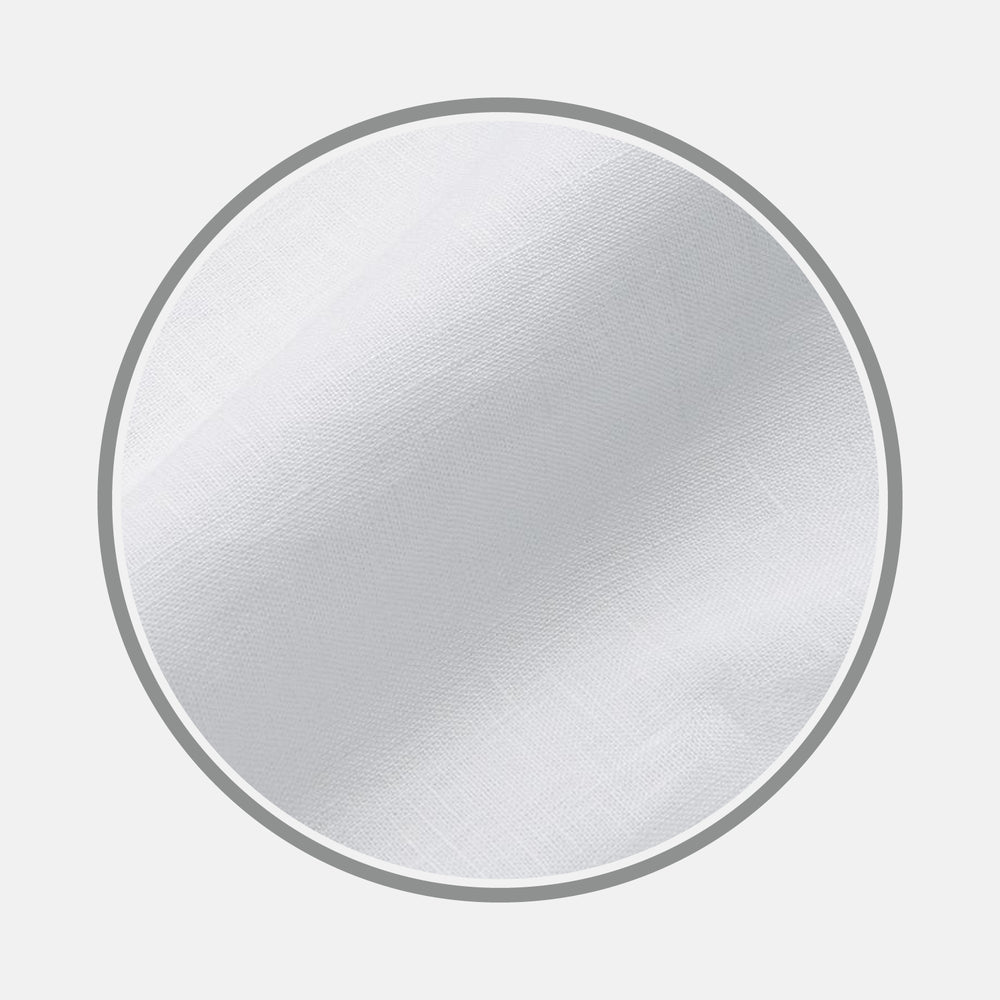 A close-up of Turnbull & Asser's Plain White Linen Fabric, featuring a fine weave and soft, smooth surface. The fabric is framed by a gray circular border on a light gray background.