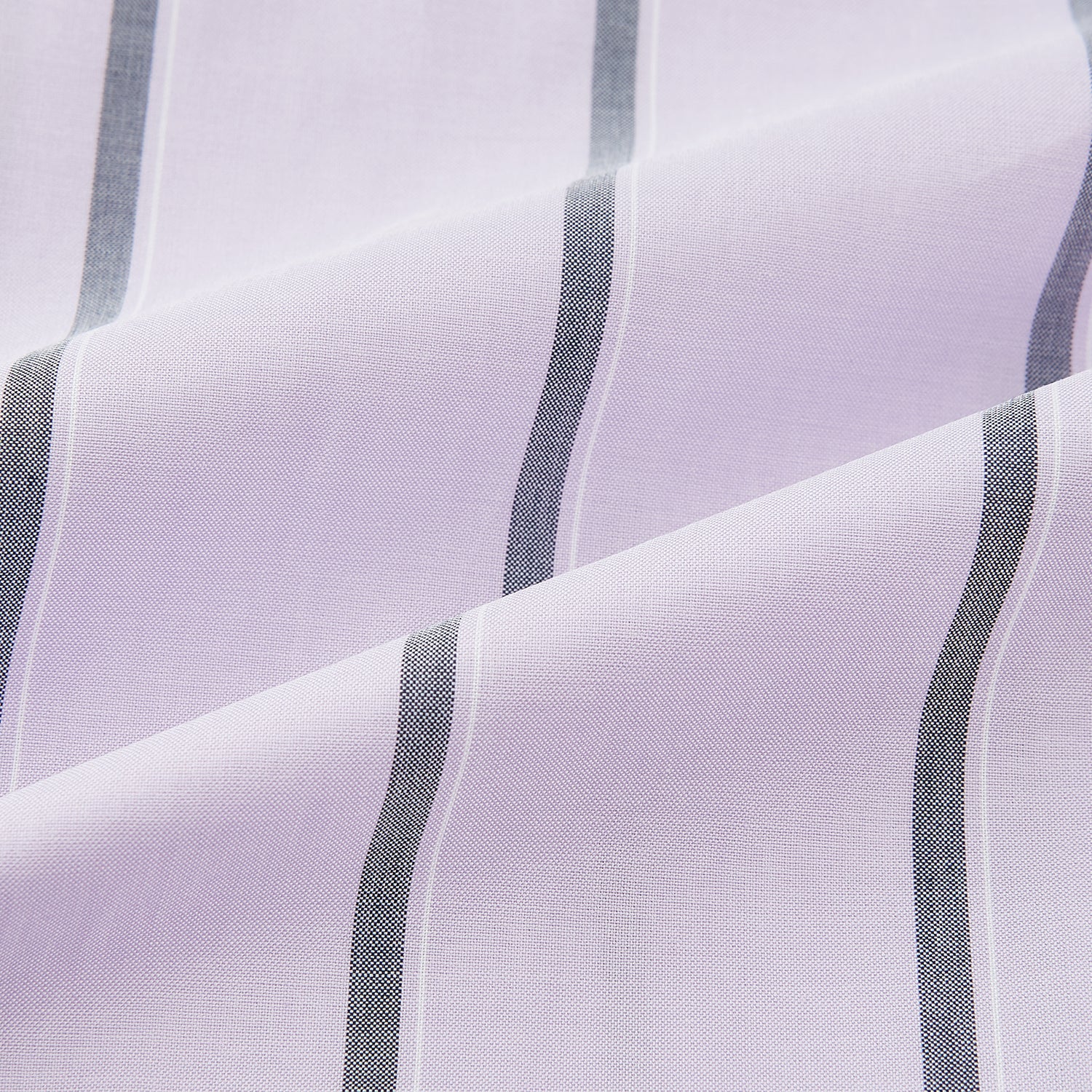 View 6 of product The Turnbull & Asser Lilac Track Stripe Shirt with Contrast T&A Collar and Cuffs features vertical black stripes, a white pointed collar, and white cuffs, shown flat against a white background.