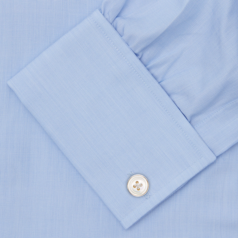 A Grey Cashmere Blend Shirt by Turnbull & Asser with a T&A collar and 3-button cuffs is neatly folded, showing its label, on a plain white background.
