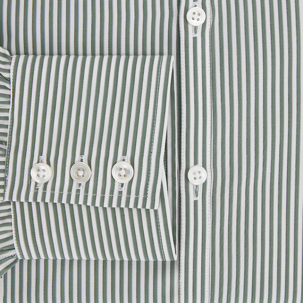The Melon Green Halo Stripe Westminster Shirt by Turnbull & Asser, featuring thin green and white stripes and a classic Turnbull collar, is displayed against a plain white background—a testament to refined British craftsmanship.