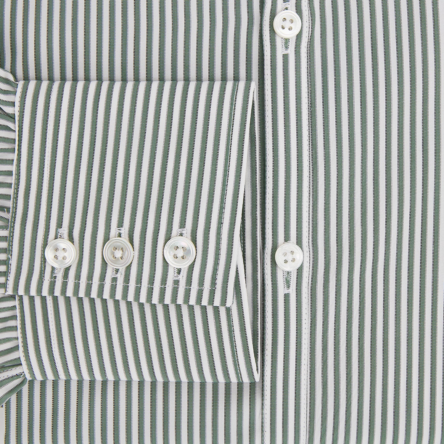 View 4 of product The Melon Green Halo Stripe Westminster Shirt by Turnbull & Asser, featuring thin green and white stripes and a classic Turnbull collar, is displayed against a plain white background—a testament to refined British craftsmanship.