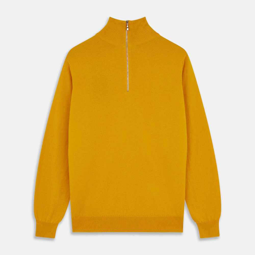 Close-up of the Gold Lennox Cashmere Half-Zip Jumper by Turnbull & Asser, featuring a mustard yellow knit, high ribbed collar, and silver center zipper—expertly crafted in Scotland.