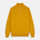 Close-up of the Gold Lennox Cashmere Half-Zip Jumper by Turnbull & Asser, featuring a mustard yellow knit, high ribbed collar, and silver center zipper—expertly crafted in Scotland.