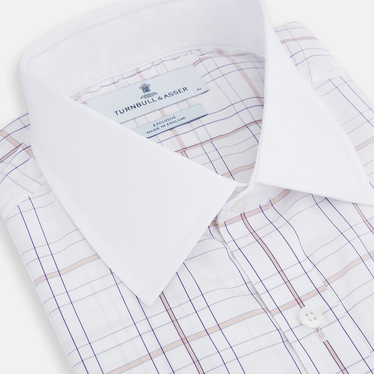 View 2 of product The Turnbull & Asser Purple Multi Plaid Check Shirt features a spread collar, double cuffs, and a fitted silhouette. Its bold plaid pattern and contrast collar add a modern touch to classic British style. Displayed on a plain white background.