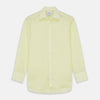 View 1 of product The Turnbull & Asser Yellow Linen Regular Fit Mayfair Shirt is a long-sleeve button-up with a collar and buttoned cuffs, shown laid flat on a white background.