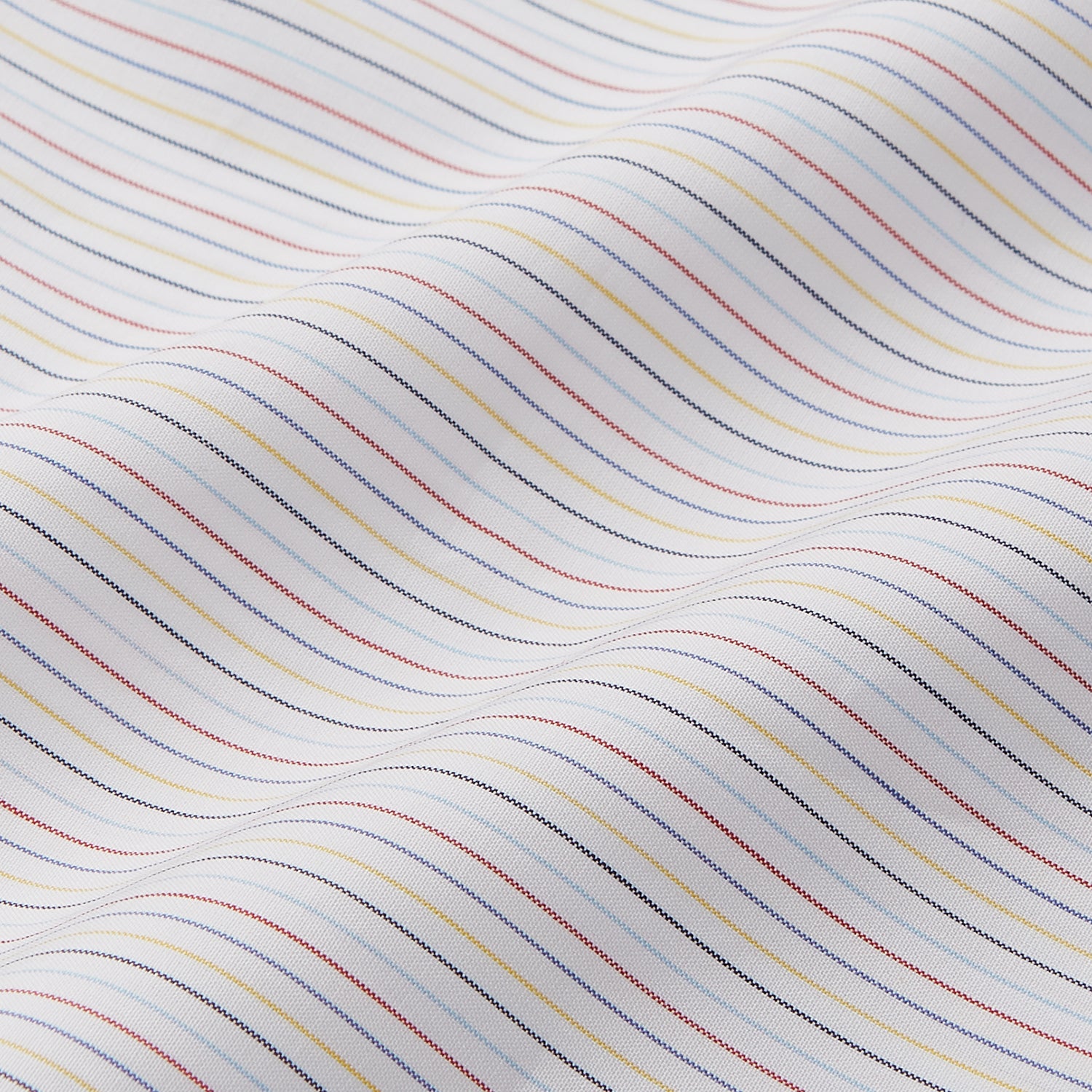 View 4 of product The Turnbull & Asser Red Multi Stripe Tailored Fit Shelton Shirt features subtle vertical stripes, a classic Kent collar, and buttoned cuffs, shown laid flat on a white background.