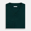 View 4 of product The Turnbull & Asser Forest Green Cashmere V-neck Jumper features ribbed cuffs and hem, shown against a white background—an essential knitwear staple for any wardrobe.